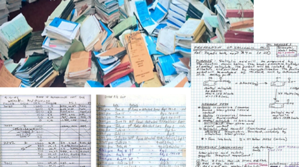 piles and piles of hand written field note journals cover an office floor with a few notebooks open to example pages